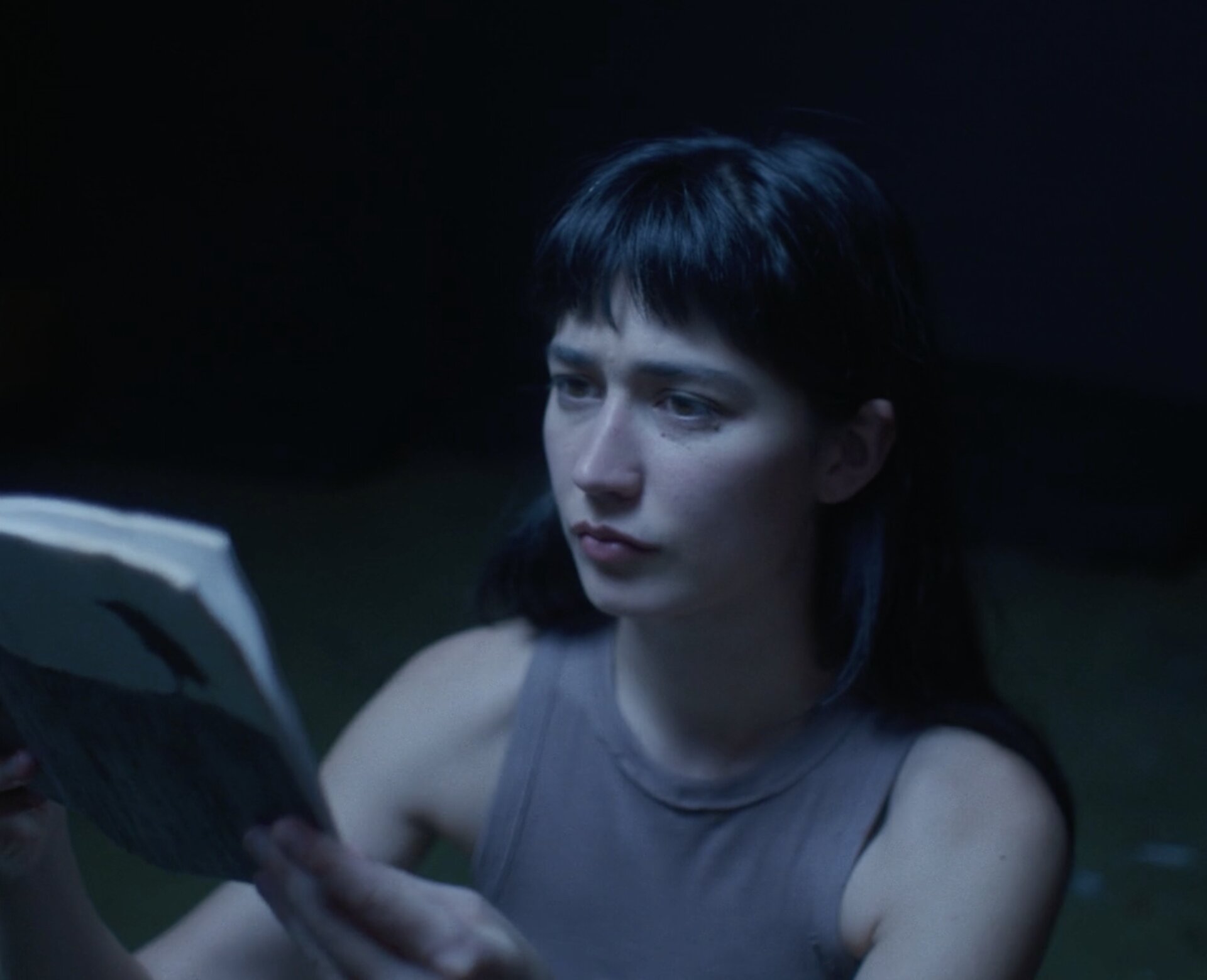 Nova reading the Book of Crows